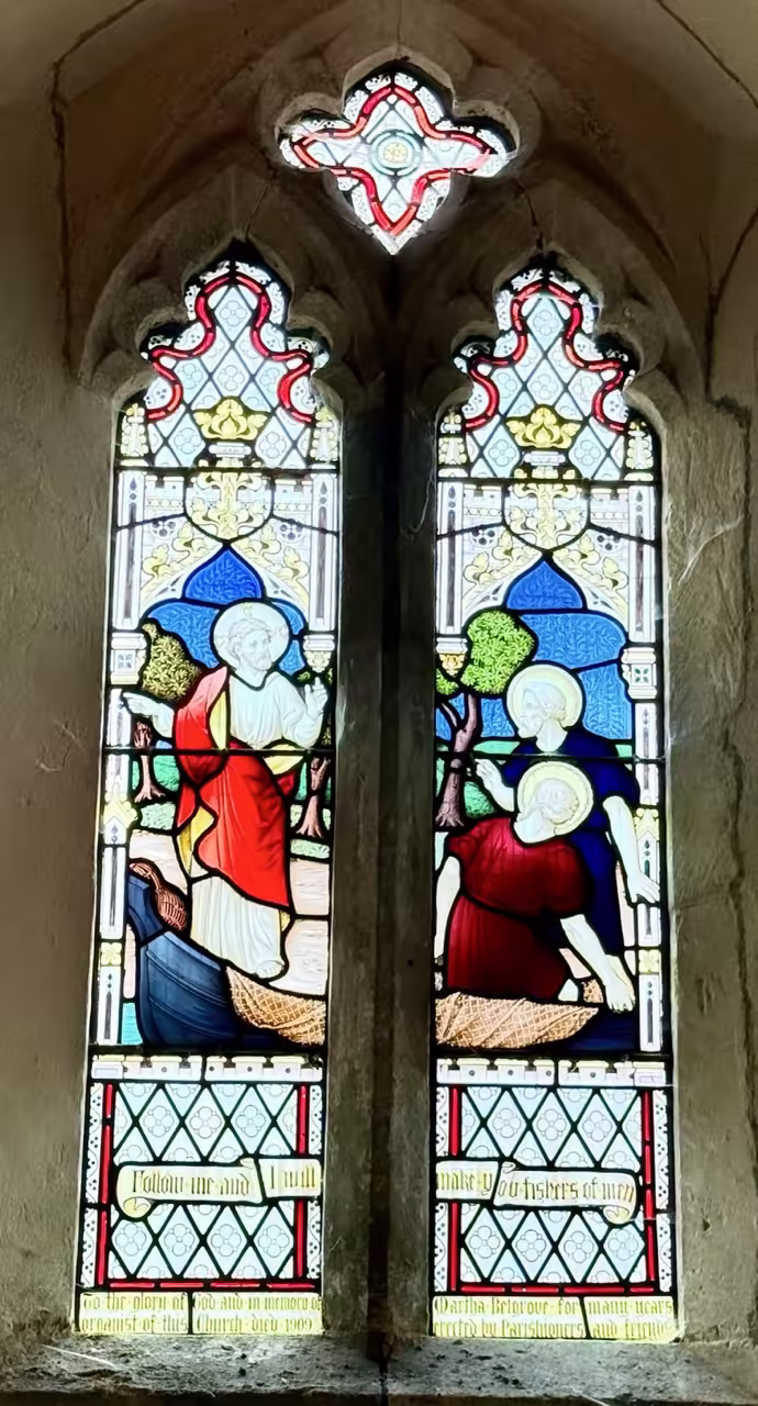 Stained glass depicting Jesus calling Simon Peter and Andrew by the Sea of Galilee